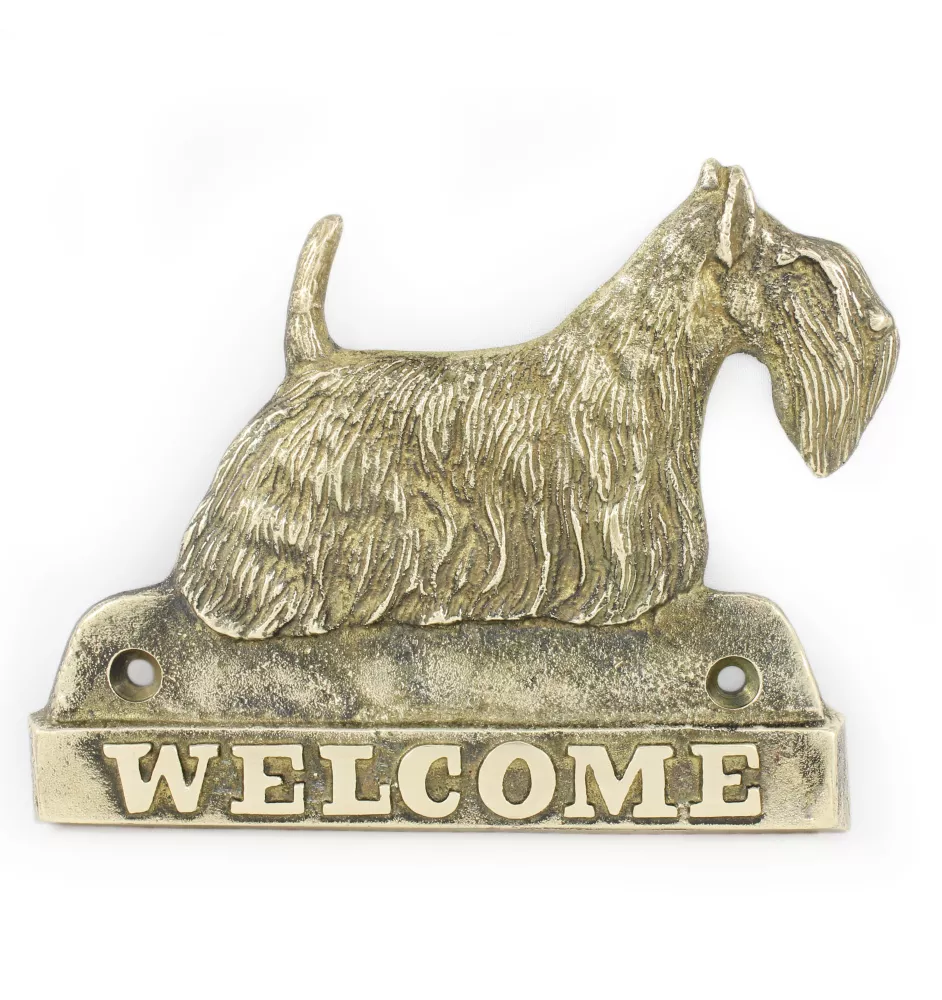 Terrier écossais, Scottish terrier - une plaque de porte avec un chien, une plaque de bienvenue en laiton, une enseigne exceptionnelle avec l'inscription Welcome de la marque Art-Dog