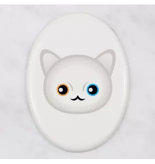 Khao Manee - une plaque funéraire en céramique avec une illustration et un texte de la marque Art-Dog